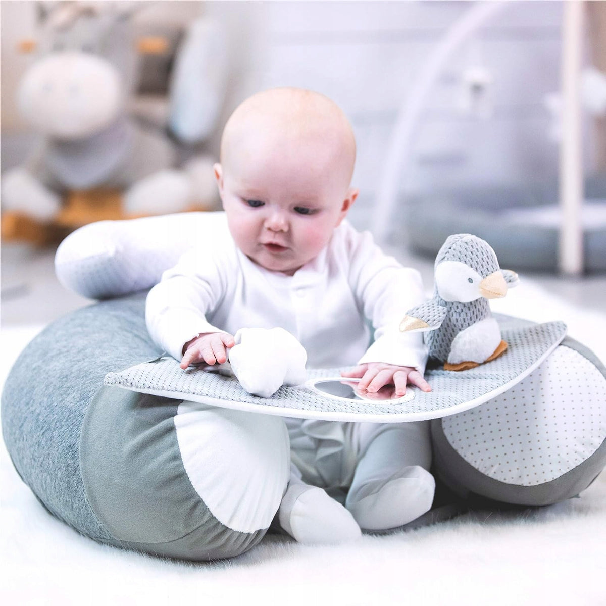 NUBY Sit-Me-Up infant seat with penguin motif