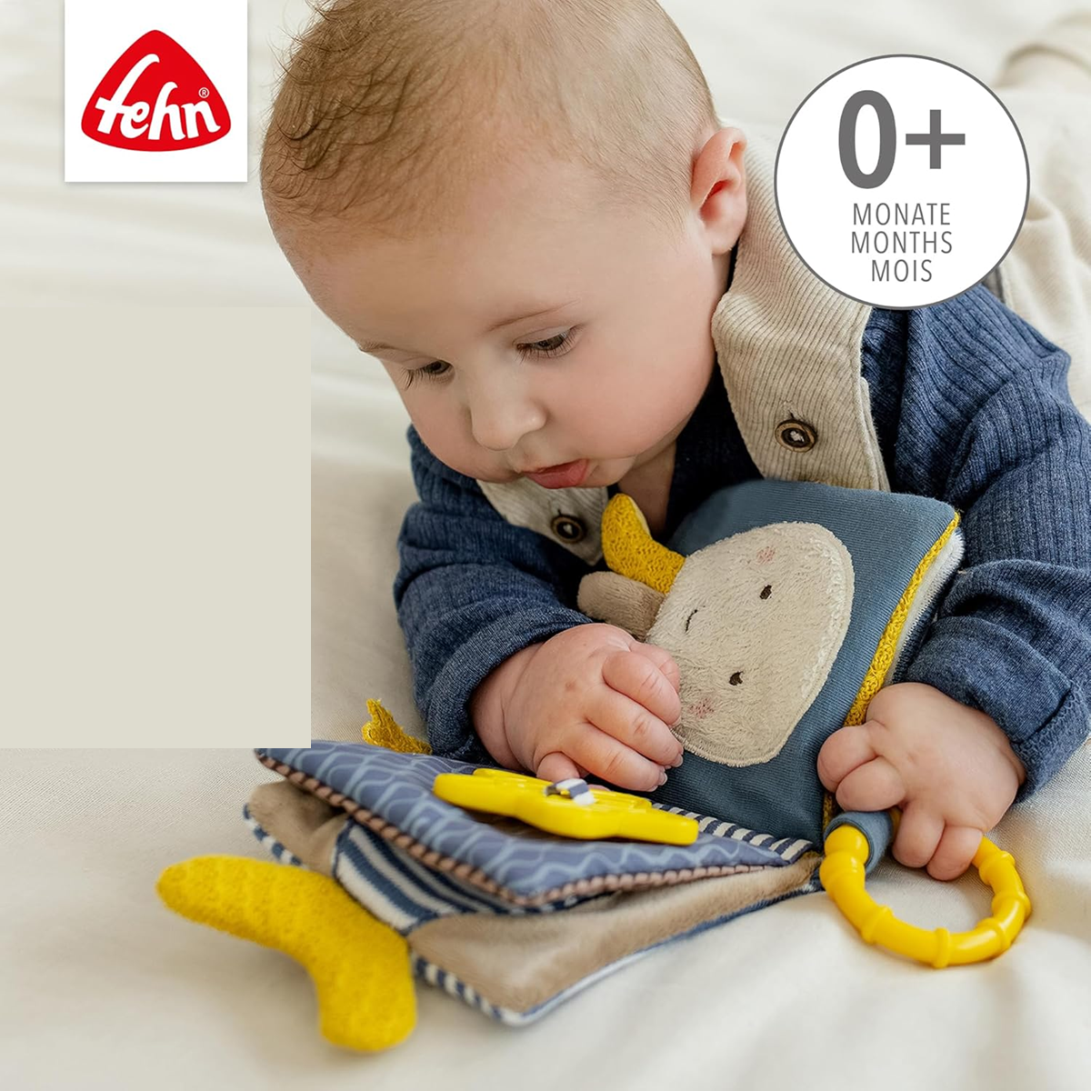 FEHN Lontra Theo livrinho sensorial com espelho PENDENTE 11 x 11 cm