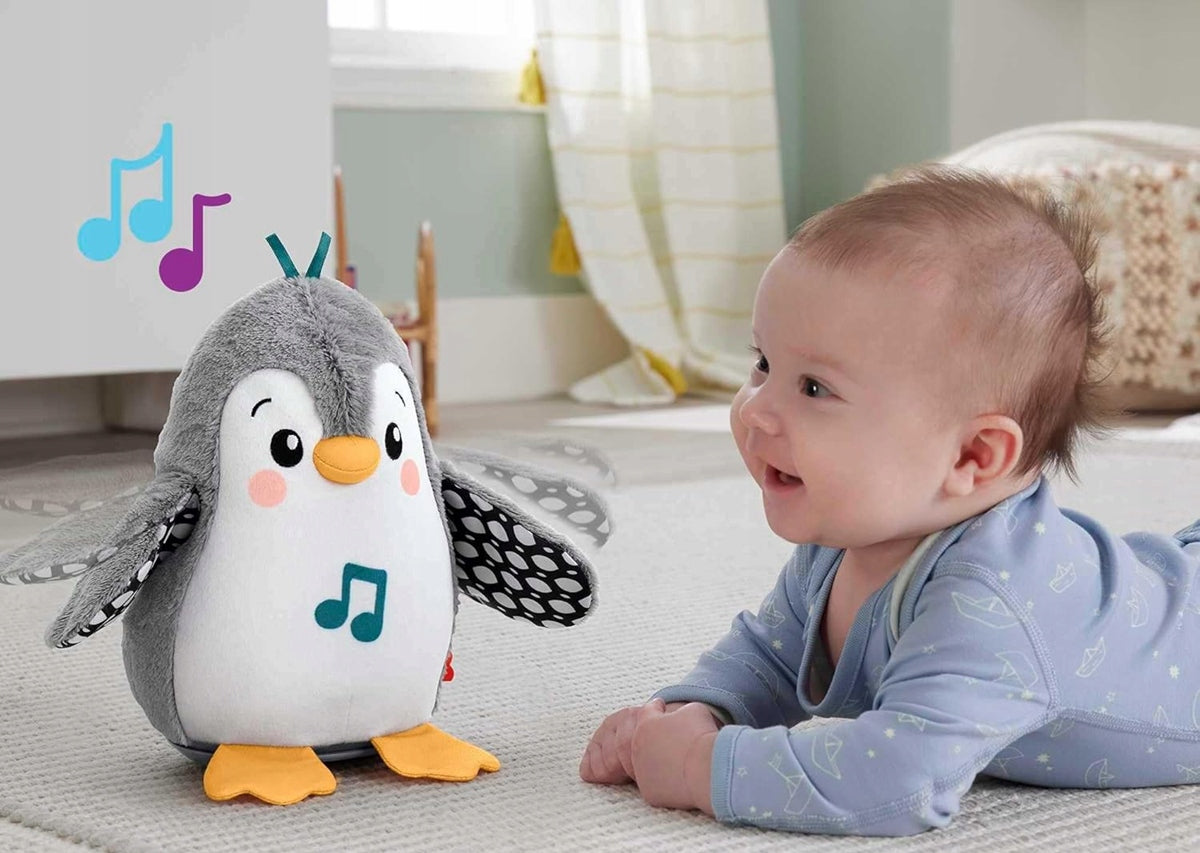 FISHER-PRICE HNC10 kiwający się pingwin z melodiami 21 cm – zdjęcie produktu 4