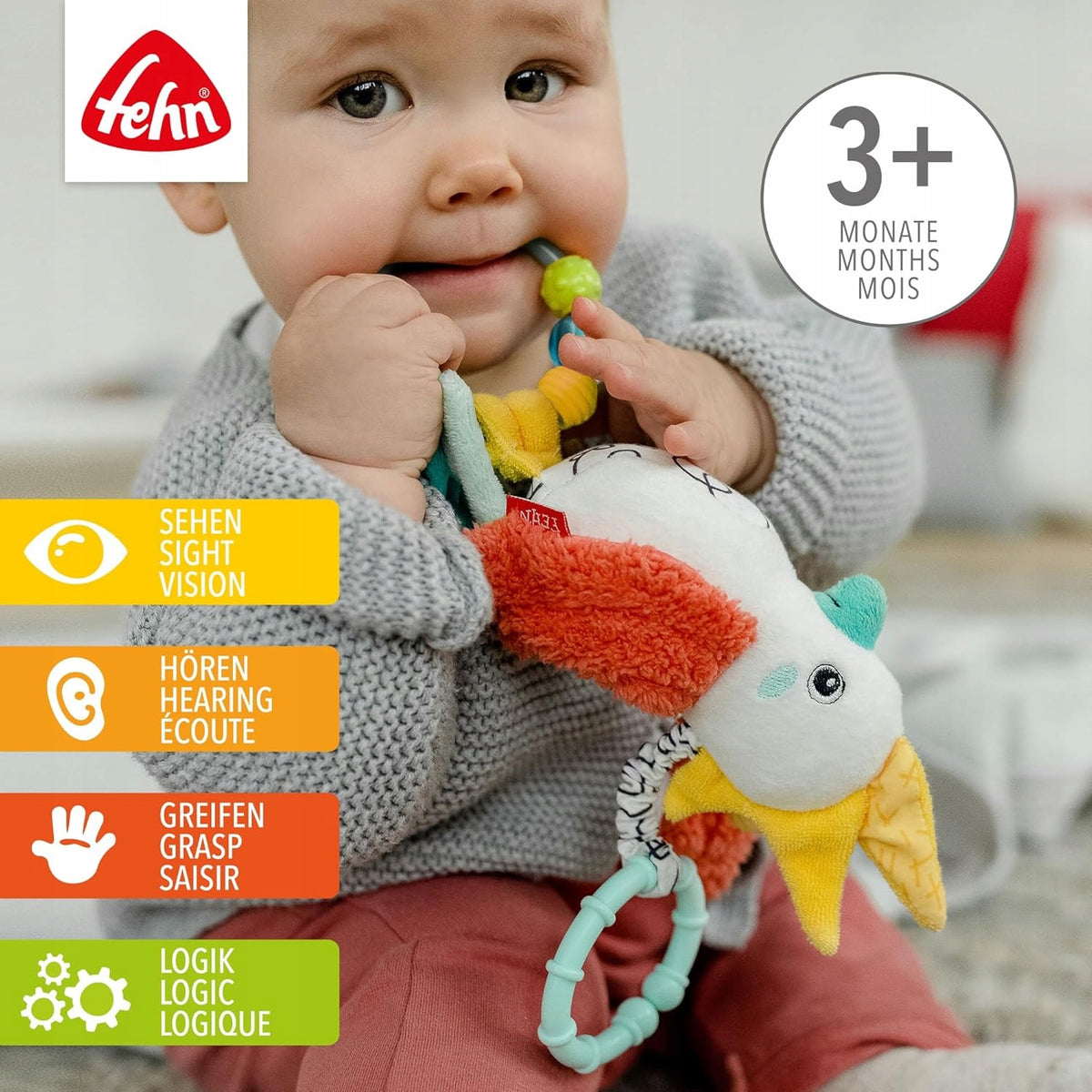 FEHN Dobabydoo suspension sensorielle pour poussette PERROQUET