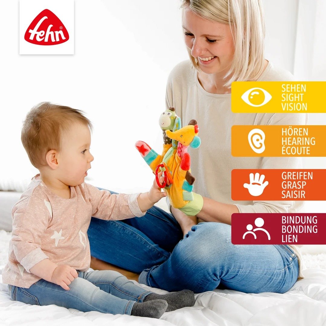 Fehn Safari pacynka sensoryczna z grzechotką – wielokolorowa Najważniejsze cechy: forma dopasowana do dziecięcej zabawy,…