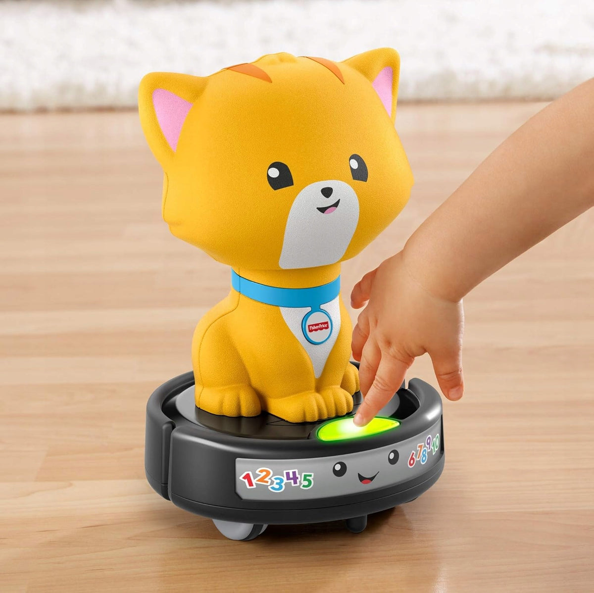 FISHER-PRICE GMX70 chat roulant sur un aspirateur robot avec mélodies et lumières