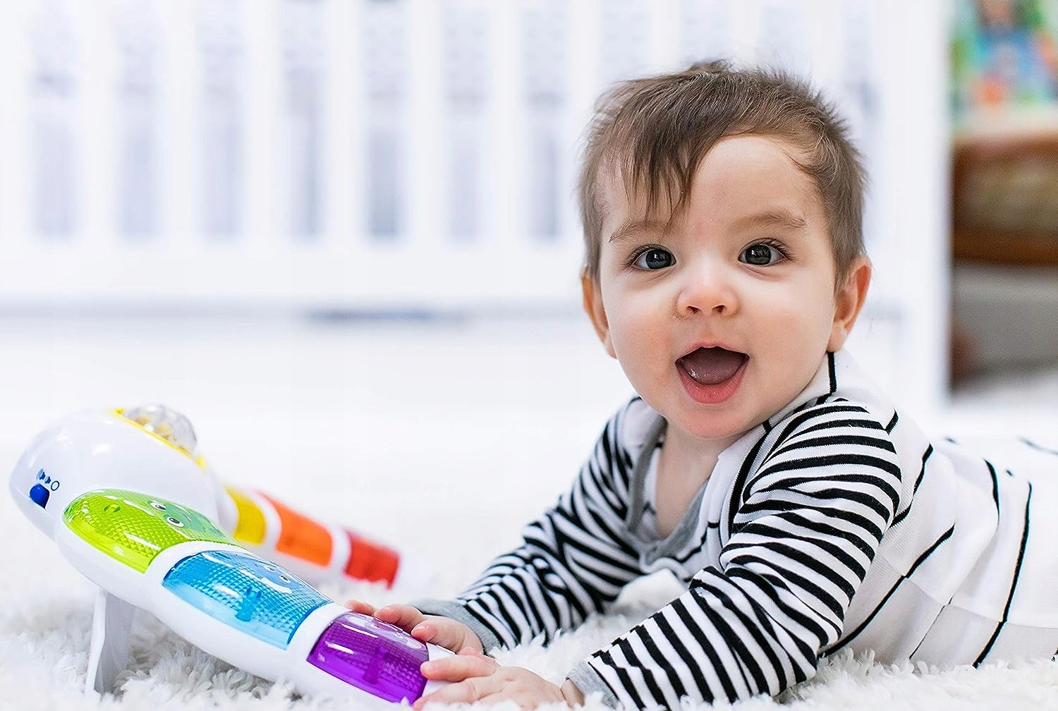 BABY EINSTEIN panel świetlny z grzechotką, melodiami i słowami w 3 językach – zdjęcie produktu 4