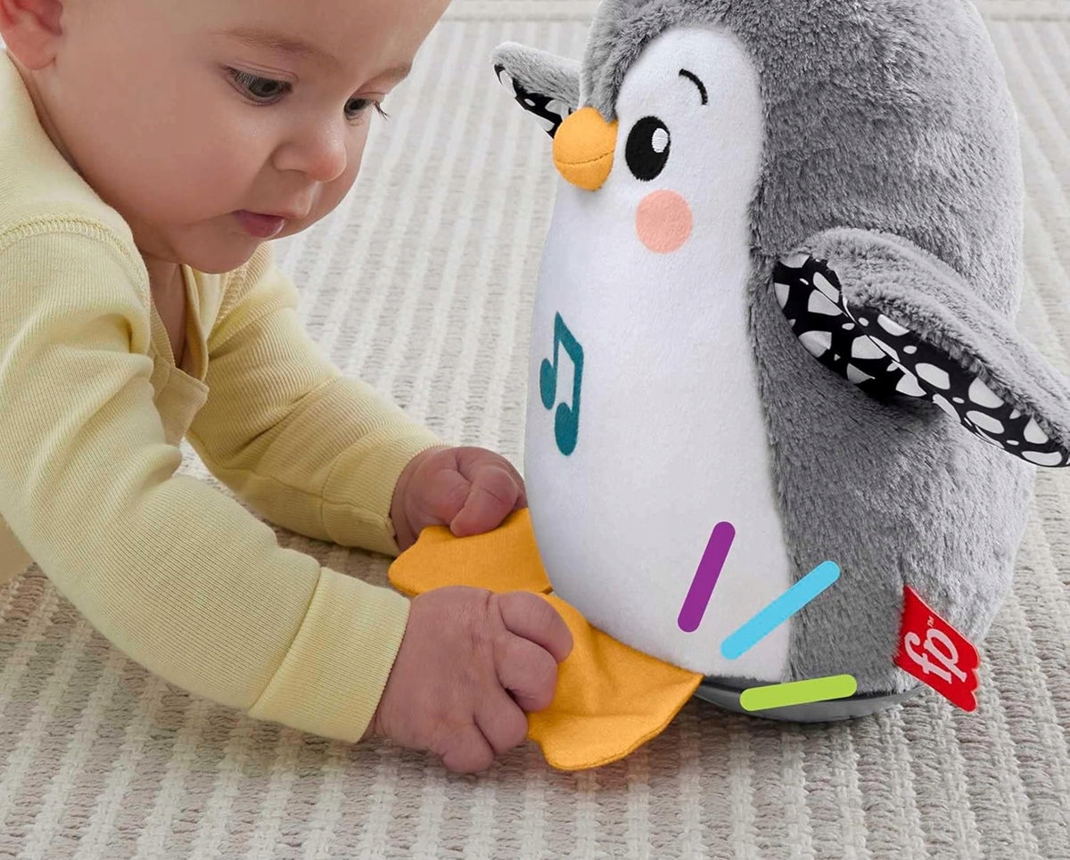 FISHER-PRICE HNC10 kiwający się pingwin z melodiami 21 cm – zdjęcie produktu 3