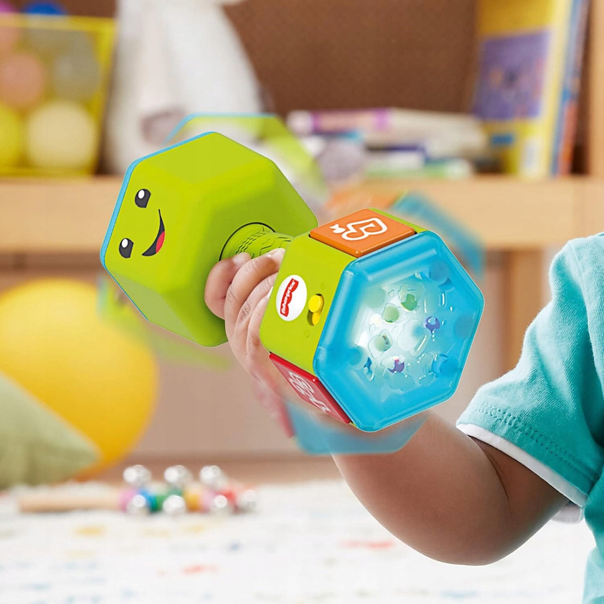 FISHER-PRICE interaktywny hantel grzechotka dźwięki światło J. NIEMIECKI