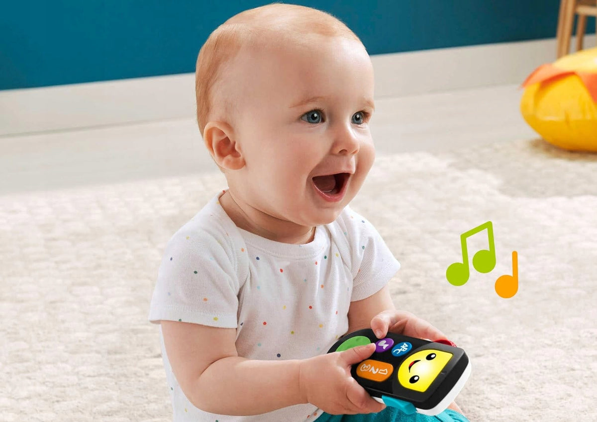 FISHER-PRICE HGY50 pilot interaktywny Smart TV J.NIEMIECKI dla niemowląt 6 m+, z muzyką i edukacją