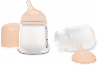 SUAVINEX zestaw startowy ZERO ZERO 180ml butelka antykolkowa z zapasowym smoczkiem i silikonową torebką