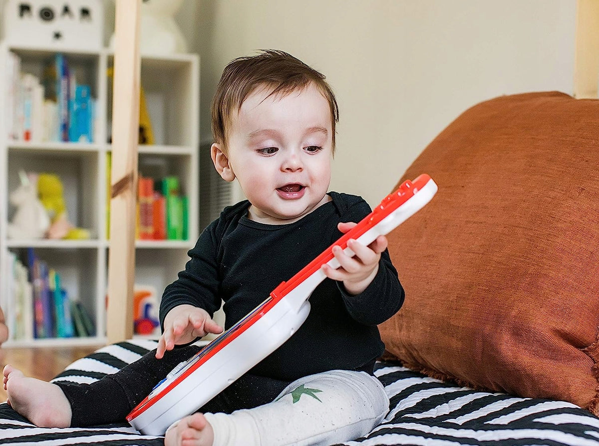 HAPE Baby Einstein ukulele 43 cm drewno, plastik, czerwony, dla dzieci 12 m+, do nauki i zabawy