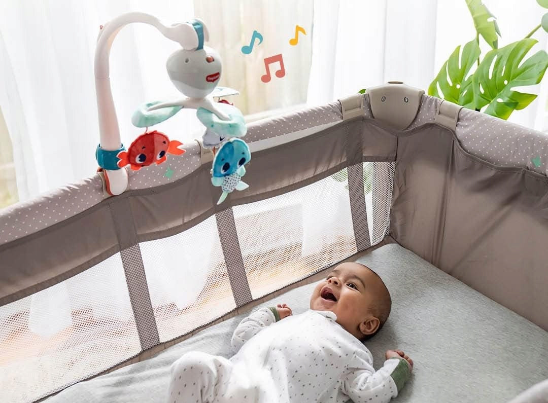 TINY LOVE Skarby Oceanu KARUZELA podróżna 3w1 do łóżeczka i wózka z muzyką i pluszowymi maskotkami