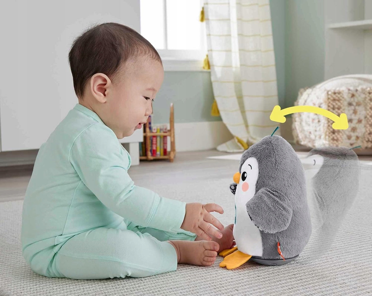 FISHER-PRICE HNC10 kiwający się pingwin z melodiami 21 cm, zabawka interaktywna dla niemowląt