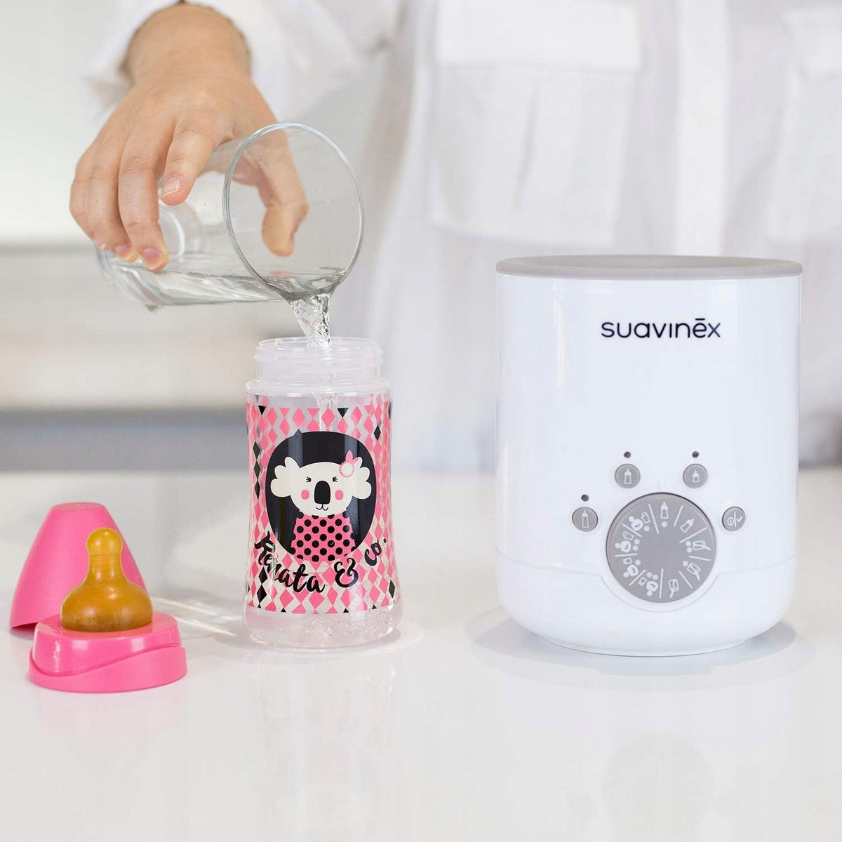 SUAVINEX chauffe-biberon et chauffe-pots 3-en-1