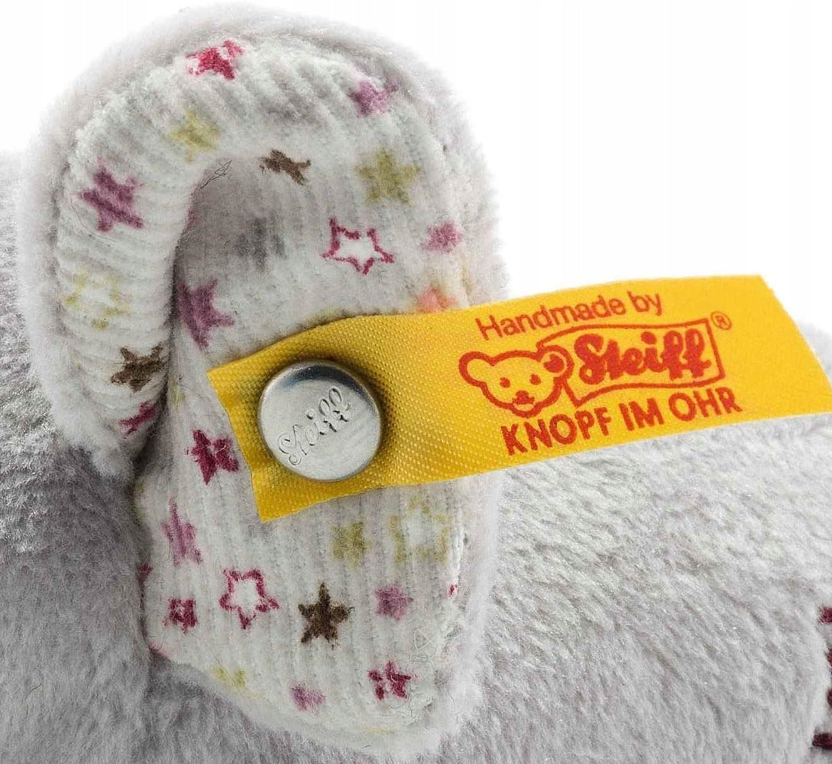 STEIFF mini szeleszcząca grzechotka SŁOŃ 11 cm, miękki szary słonik z metką i kolorowym wzorem gwiazdek