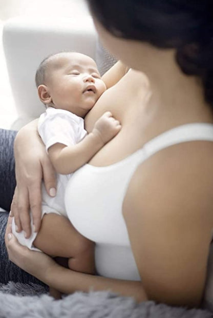 MEDELA top z biustonoszem do karmienia – biały, wygodny top z wbudowanym biustonoszem do karmienia matki z dzieckiem.