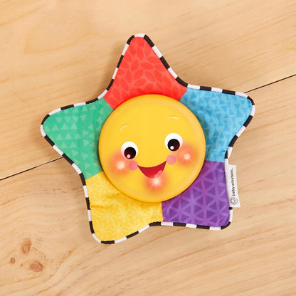 BABY EINSTEIN zabawka muzyczna ze światełkami GWIAZDA 19 cm, kolorowa gwiazdka z buzią i światełkami