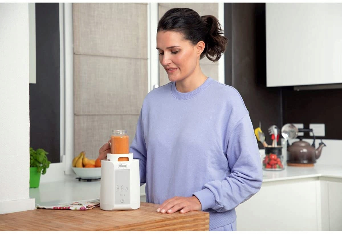 CHICCO Home PODGRZEWACZ DO BUTELEK I SŁOICZKÓW biały podgrzewacz do mleka i słoiczków w kuchni