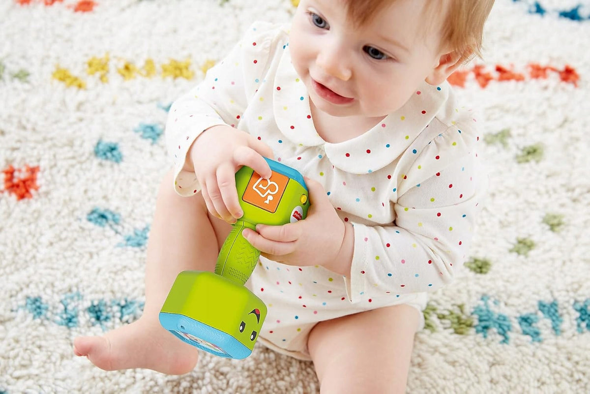 FISHER-PRICE interaktywny hantel grzechotka dźwięki światło J. NIEMIECKI