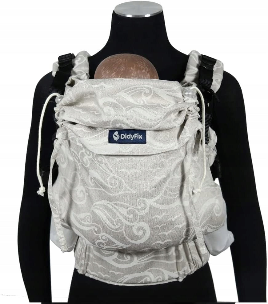 DIDYMOS DidyFix nosidełko ergonomiczne 0-25kg beżowe z tłoczeniami, noszenie przodem do rodzica na manekinie