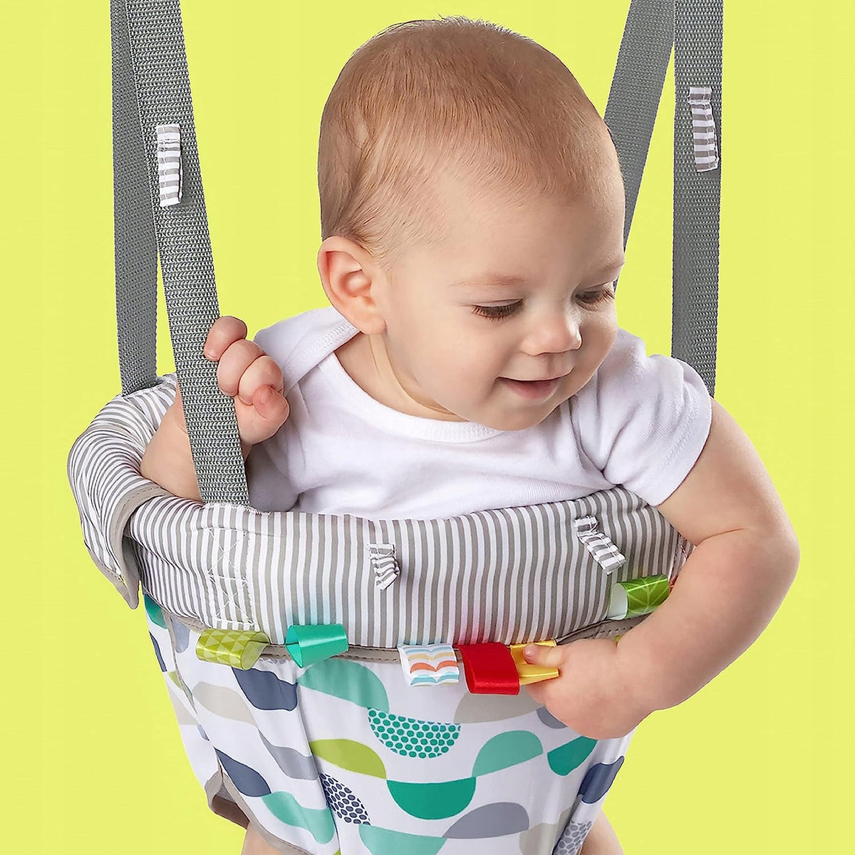 BRIGHT STARTS skoczek futrynowy PLAYFUL PARADE dla dziecka 6m+, kolorowy i bezpieczny