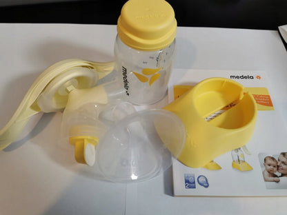 MEDELA Harmony 005.2052 laktator ręczny 2-fazowy U, żółty, używany, z akcesoriami