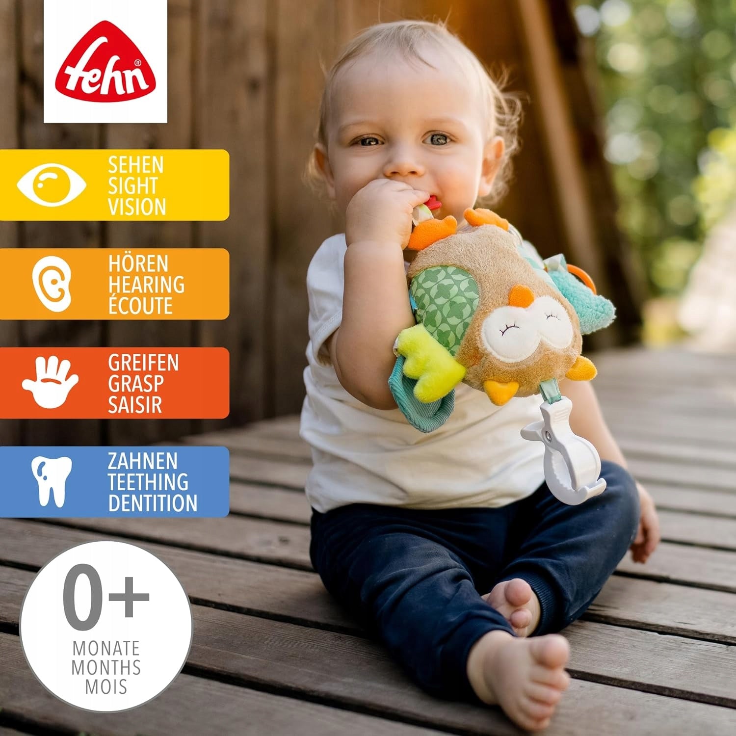FEHN Sleepy Forest hanging toy with a rattle and clip for a stroller or car seat