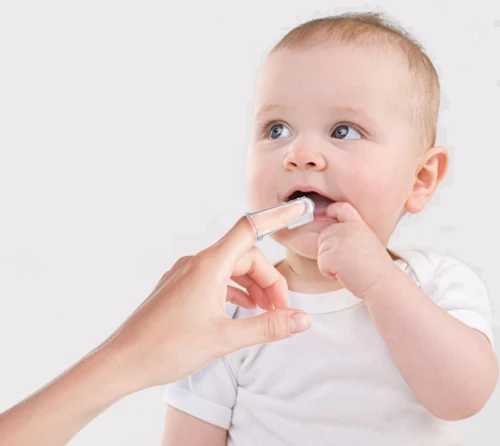 NUBY brosse à dents en silicone pour doigt + étui